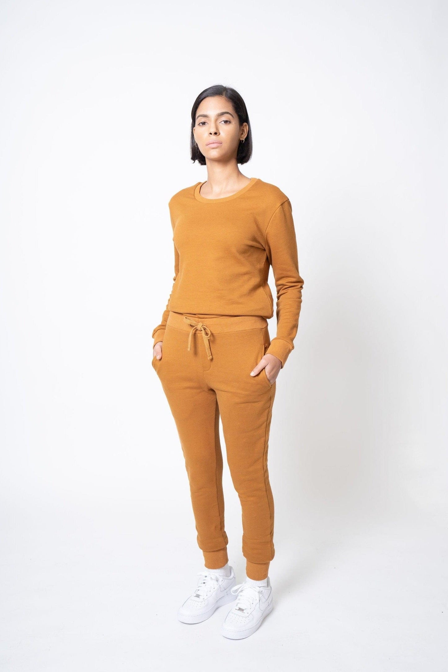 Model wearing matching cotton sweatshirt and sweatpant for women