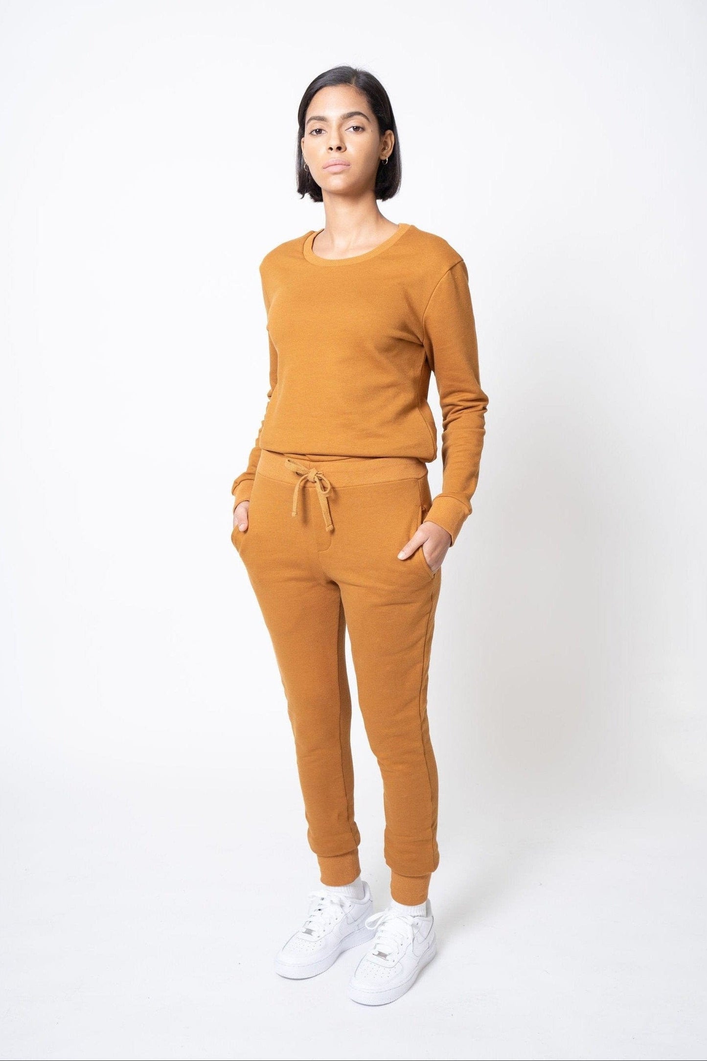 Model wearing matching cotton sweatshirt and sweatpant for women