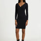 Model in black wrap dress