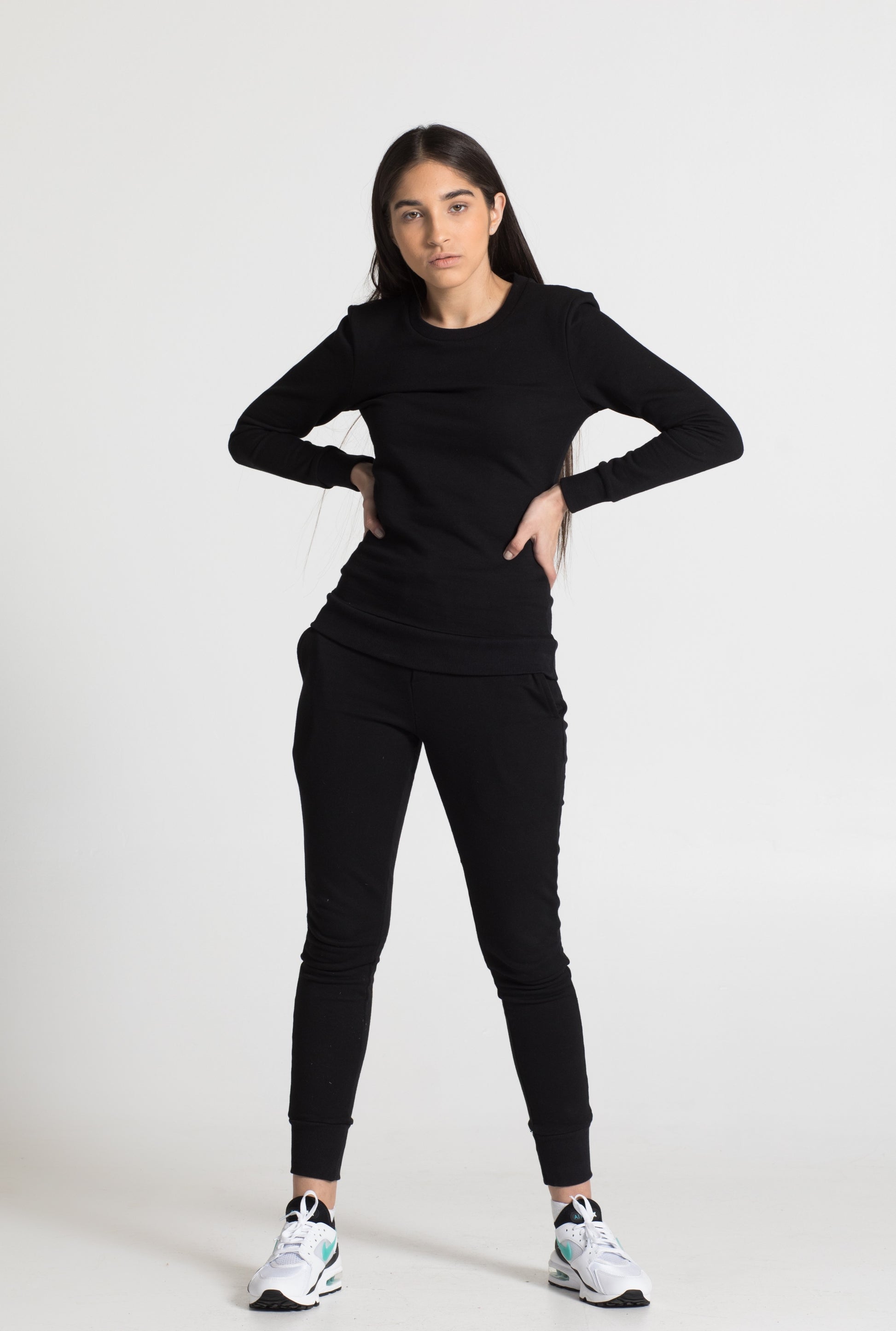 Model in black cotton sweatpant, frontview