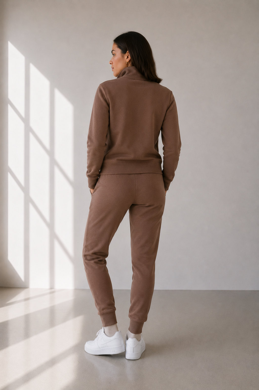 Back view of model in mocha brown sweatsuit