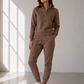 Model in half zip sweatshirt and sweatpant in mocha brown color.