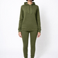 Person wearing an olive green hoodie and jogger set on a white background