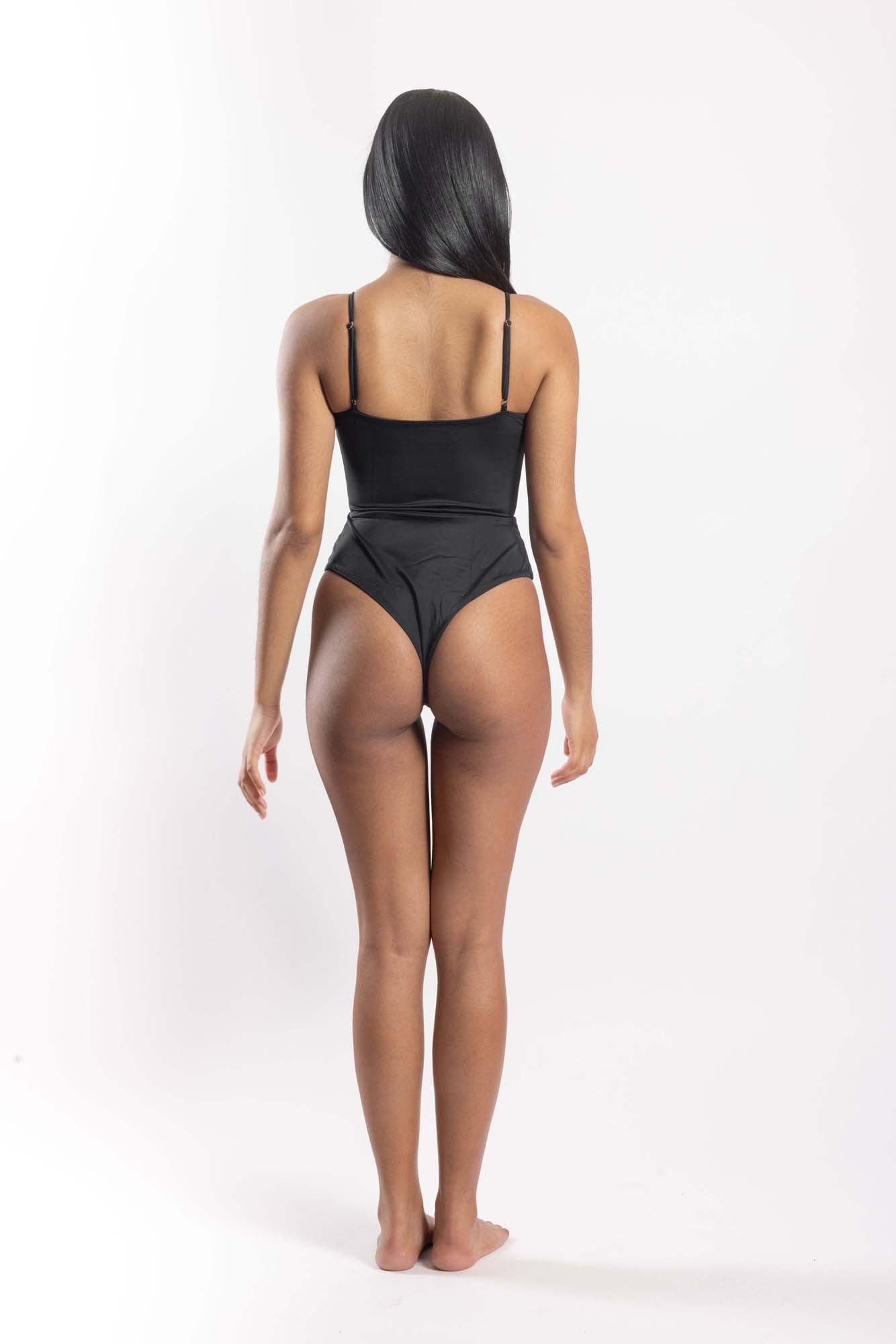 Back view of women’s sustainable one-piece swimsuit in black